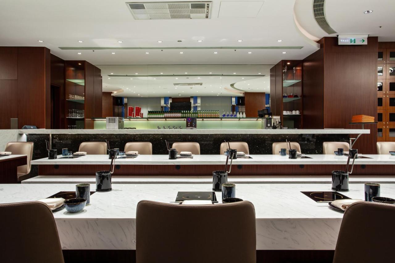 Ambassador Hotel Hsinchu Экстерьер фото The Hong Kong Stock Exchange